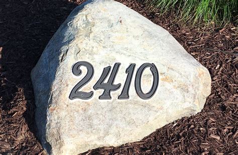 painting house numbers on rocks